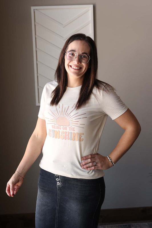 Boost your energy and style with our "Bring On The Sunshine" tee! Made with slim-fit Bella Canvas material, this motivational shirt is perfect for everyday wear. Don't wait, grab yours today and spread the happy vibes. Remember to size up for the perfect fit, as they are a slim-cut style. Classy Closet online women's boutique clothing store for cute spring summer outfits, mom outfits, and modest fashion!