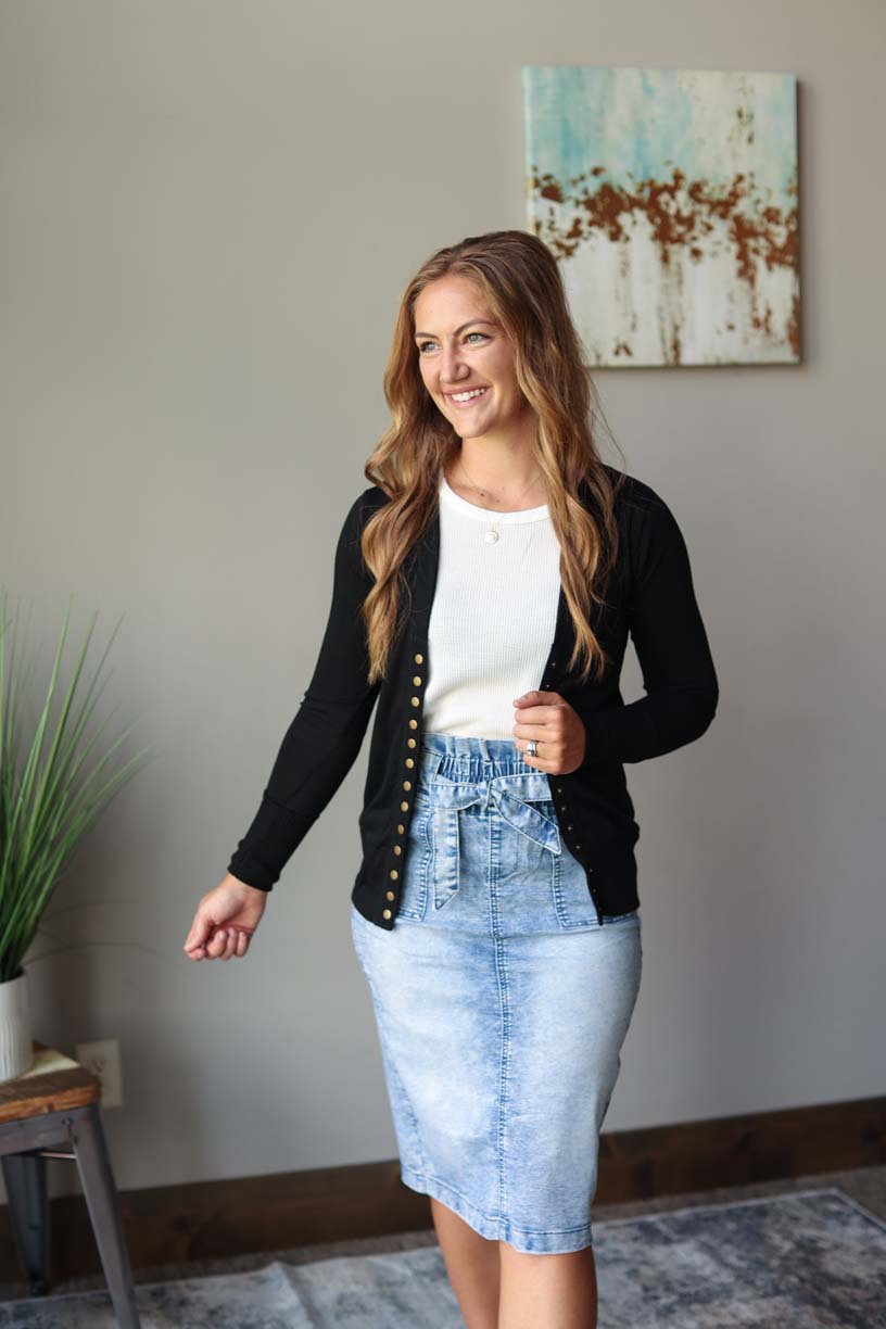 Hot pink snap cardigan styled on a model, perfect for a versatile and affordable summer sweater cardigan at Classy Closet, an online modest women's boutique.
