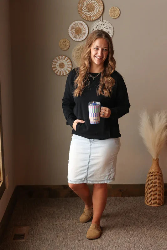 Woman wearing Black Drop Shoulder Pocket Crewneck Sweatshirt with relaxed fit, casual style perfect for everyday comfort for comfy spring style