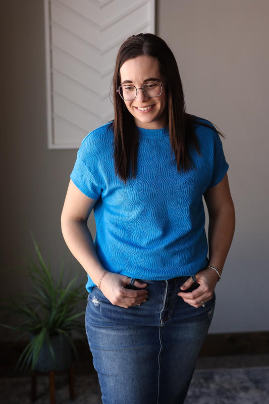 Effortlessly versatile and stylish, our Royal Blue Textured Crewneck Short Set is a must-have addition to your wardrobe. Mix and match to create endless outfit possibilities, perfect for any occasion. The high quality material ensures comfort and durability, making it the perfect outfit for anything from work to date nights. Classy Closet online women's boutiue clothing store for modest fashion and easy affordable trendy mom outfits. hull iowa