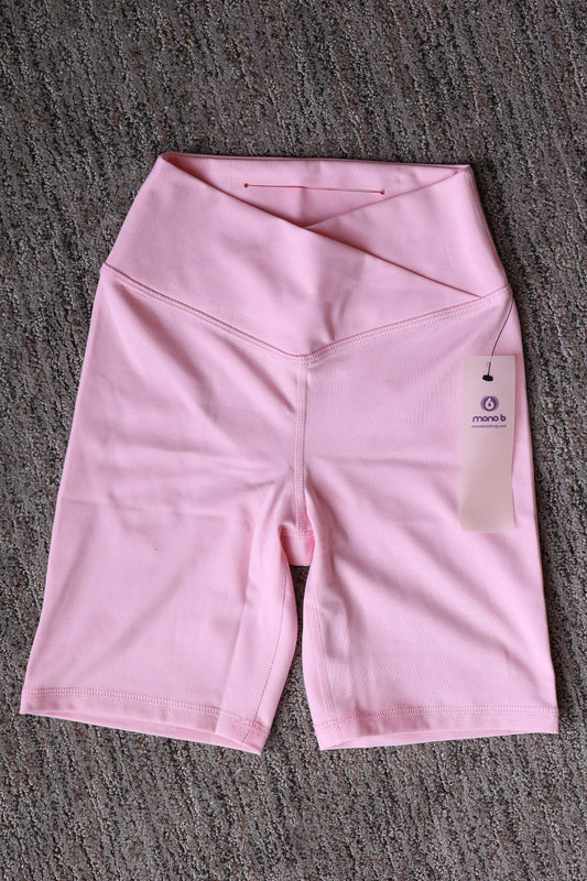 Stay cool and comfy in our Candy Pink Biker Shorts—slick, stretchy, and full of comfort layering.