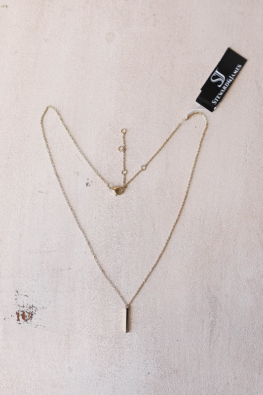 Another classic that is a must have. The Frances necklace is 14kt gold plated stainless steel, 24 inch chain with a dainty gold bar pendent. 