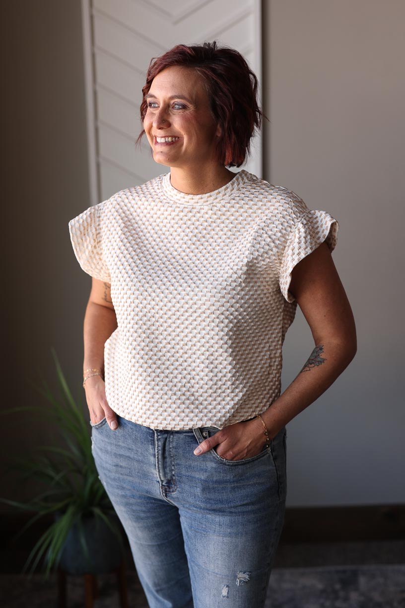 This top and shorts set is a perfect addition to your wardrobe. The stylish print effortlessly adds flair to your outfit, while the top-notch quality material ensures comfort and versatility for any occasion. Mix and match the top and bottom separately for both going out and lounging outfits. Classy Closet online women's boutique for modest fashion, cute casual outfits, and hard to find denim skirts.