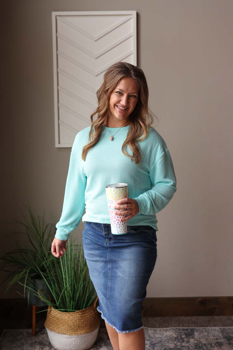 Upgrade your wardrobe with our Ocean Blue Corded Top. The calming yet uplifting color and effortless throw-on-and-go style make it a must-have. Made from our favorite material for comfort and quality. Classy Closet online women's clothing boutique for everyday style, modest fashion, and cute mom outfits. Hull, Iowa