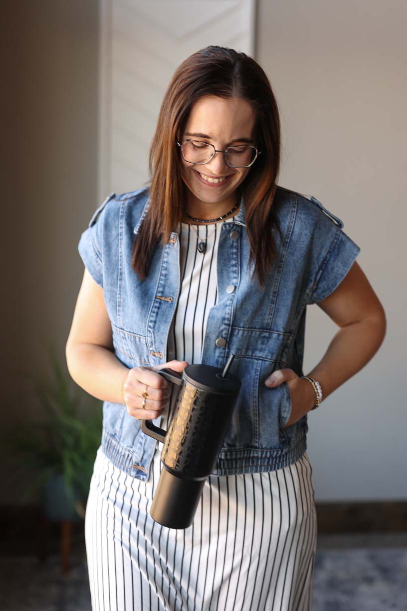 Introducing the summer must-have: Denim Wash Button Up Vest Jacket. Perfect for layering in warmer months, this jacket is the missing piece to your wardrobe. Say hello to effortless style and versatility. Classy Closet women's online clothing boutique for modest fashion and affordable trendy styles for mom outfits.