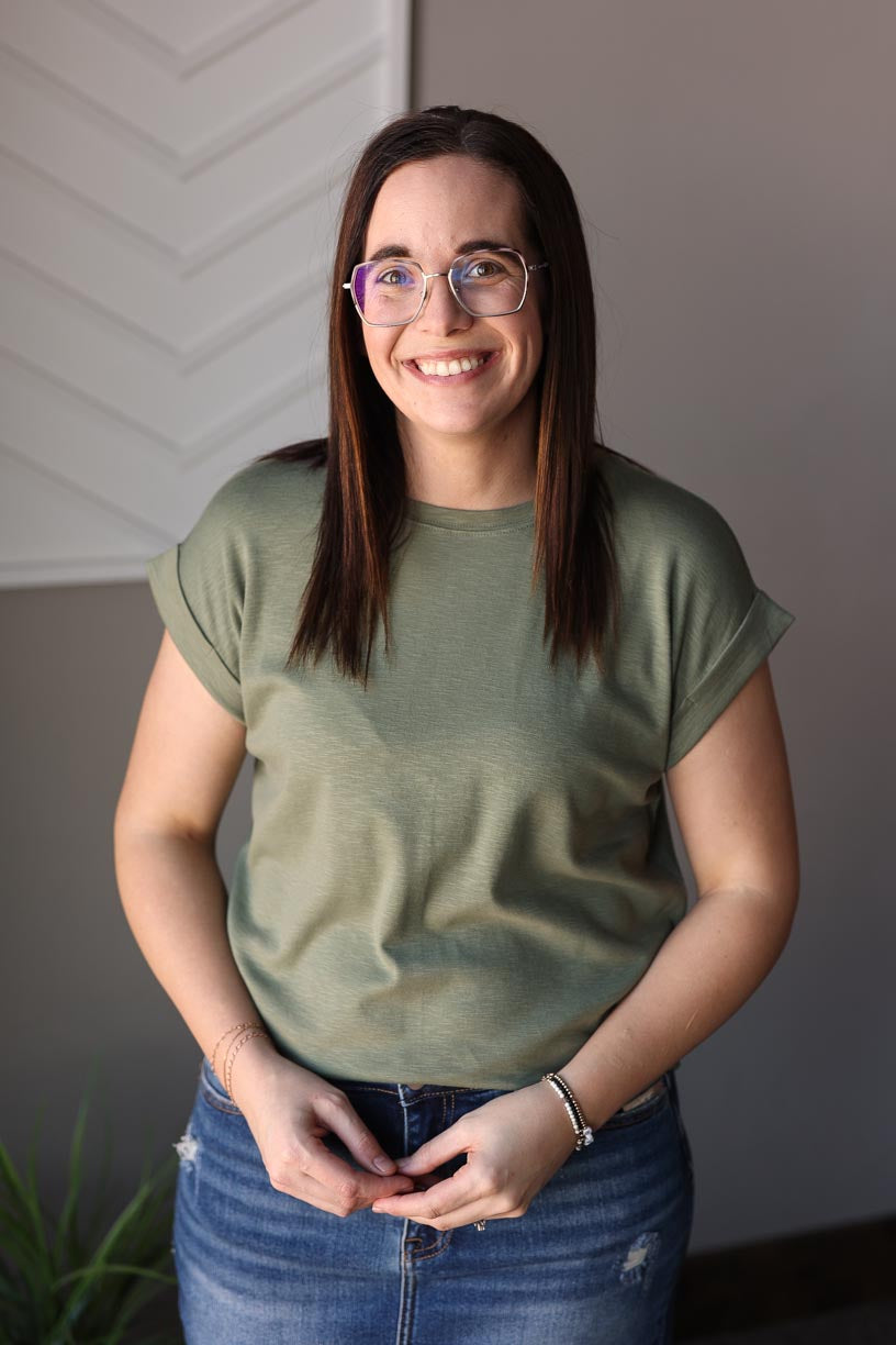 Elevate your wardrobe with our Lt. Olive Cotton Rolled Sleeve Tee. Perfect for any occasion, its versatility allows for effortless style. Made from soft, comfortable fabric, this tee is a wardrobe must-have. From casual outings to work meetings, this top has got you covered with its classic yet trendy design. Classy Closet online women's boutique for trendy, modest fashion and hard to find denim skirts. hull iowa