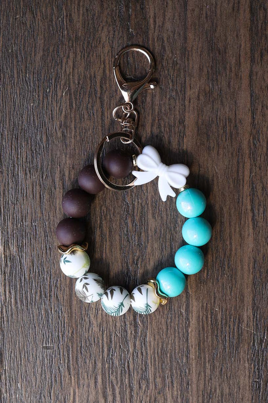 White Bow Silicone Bead Wristlet
Great gift for her!