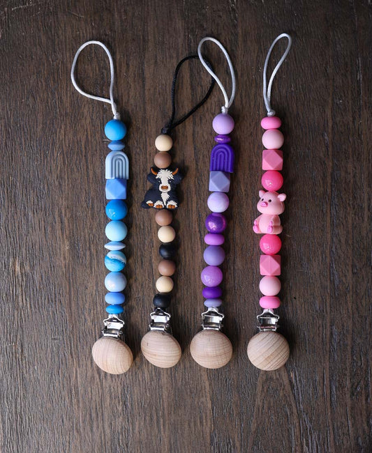 Purple Rainbow Silicone Bead Paci Clip
Great baby gift!