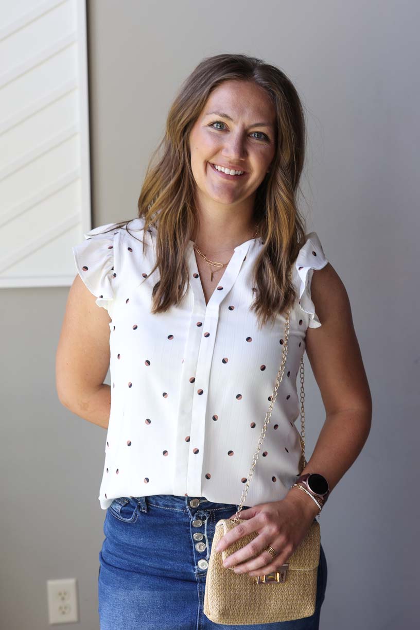 This white polka dot top is an absolute stunner! Brown and black dotted print over the lightweight fabric and while those adorable ruffle flutter sleeves add the perfect feminine touch. So versatile for summer - wear it to the office, out for dinner, or even to those special wedding celebrations! The breezy design keeps you cool and stylish no matter where your sunny adventures take you.