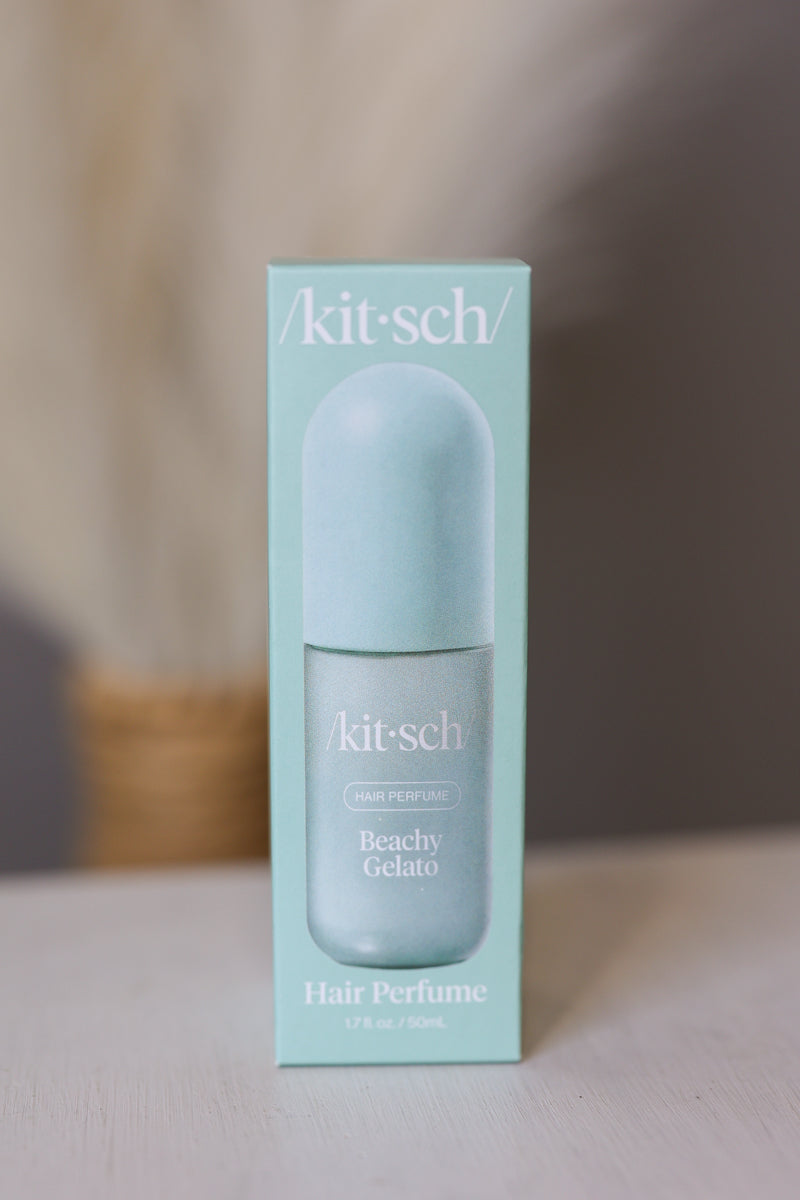 Kit-Sch Beachy Gelato hair perfume in a light mint green box with a matching frosted cap bottle, displayed on a light surface with a soft-focus background.