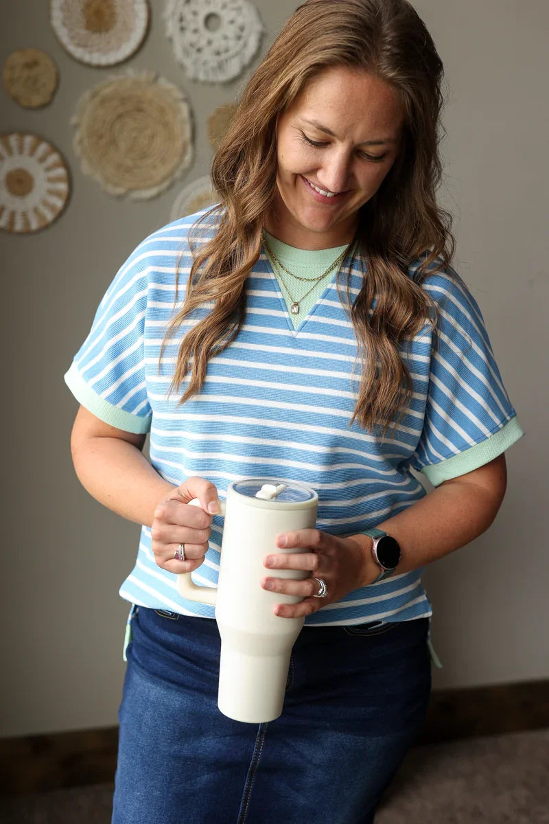 sky blue striped green textured short sleeve summer top with dark wash denim skirt