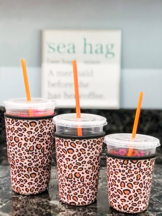 Save those hands holding those cold iced coffees! The are made of neoprene and are the perfect little beverage holders for the Summer or anytime!  Small fits Dunkin 16oz and Starbucks Grande  Medium fits Dunkin 24oz and Starbucks Venti  Large fits Dunkin 32oz and Starbucks Trenta 