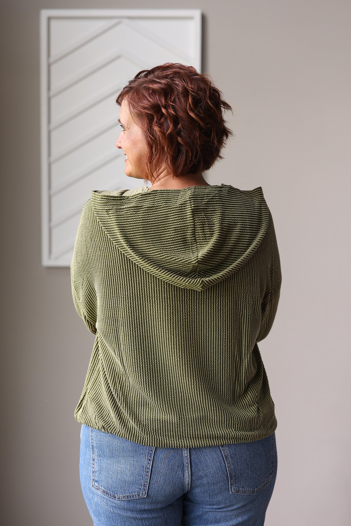olive green corded texture hoodie with kangaroo pocket for casual wear at Classy Closet