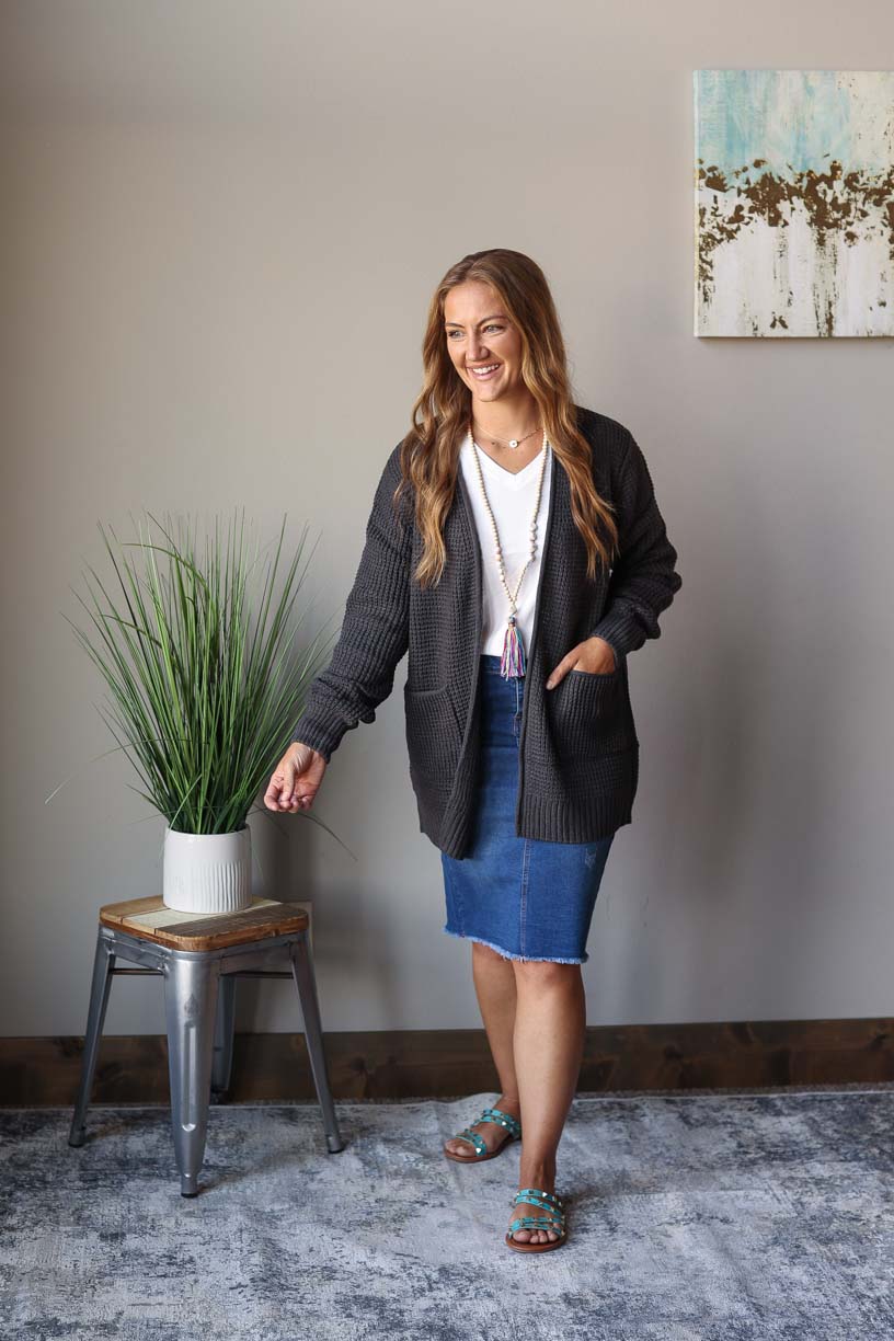Stay cozy this season with this Ash Grey Waffle Cardigan. Perfect for bonfires, chilly morning coffee time, or just lounging around the house, its waffle knit and front pockets make it both stylish and warm. Classy Closet Modest Boutique Near Me