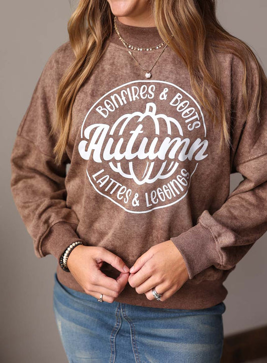 Brown Autumn Ribbed Crew Sweatshirt is cute and cozy for comfortable lounging. Its oversized fit and cozy ribbed fabric make it perfect for fall fun such as bonfires or raking leaves. Classy Closet Online Women's Fall Style Boutique