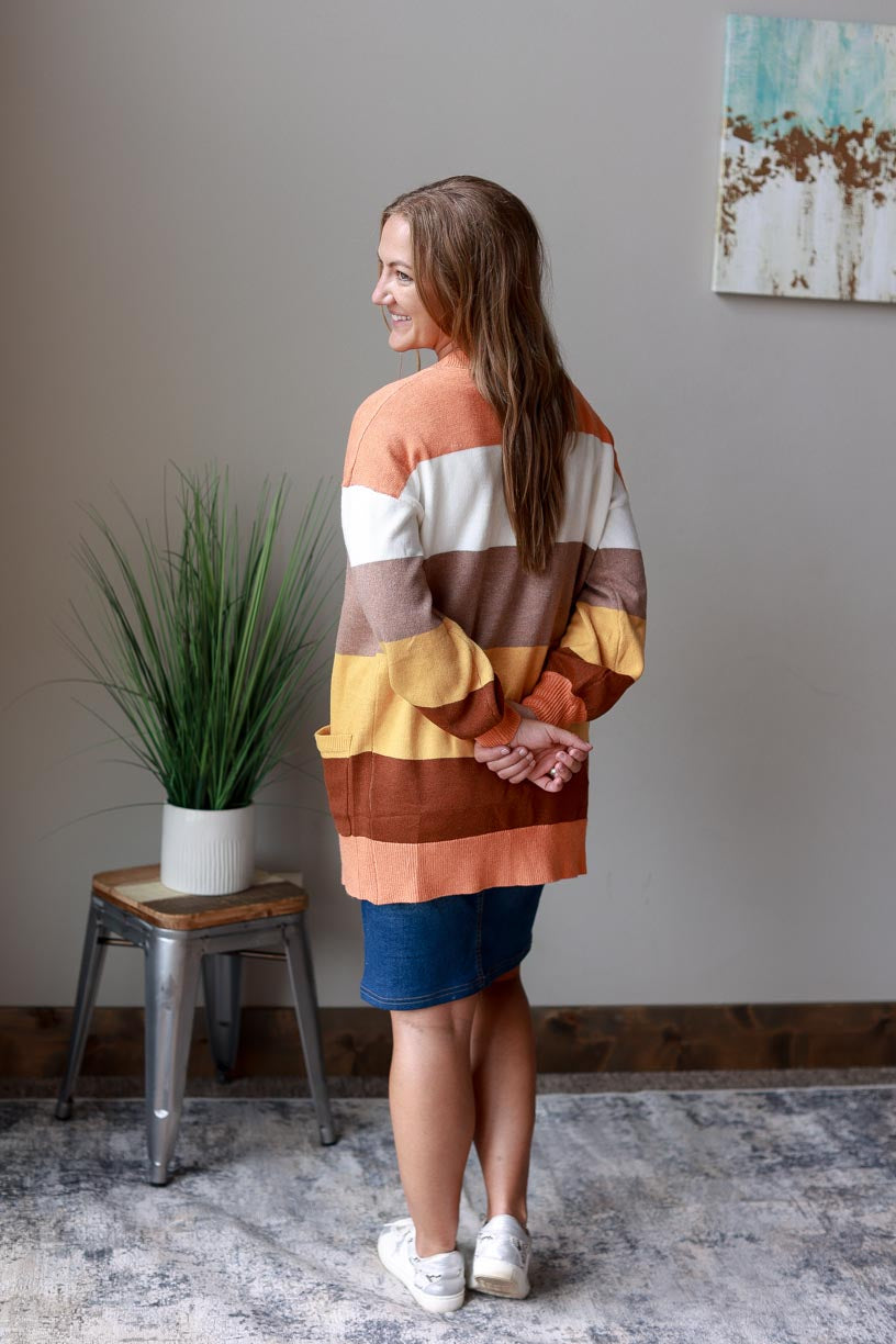 This Autumn Striped Cardigan is made with quality material for maximum comfort and durability.  Classy Closet Women's Modest Fashion Boutique Near Me