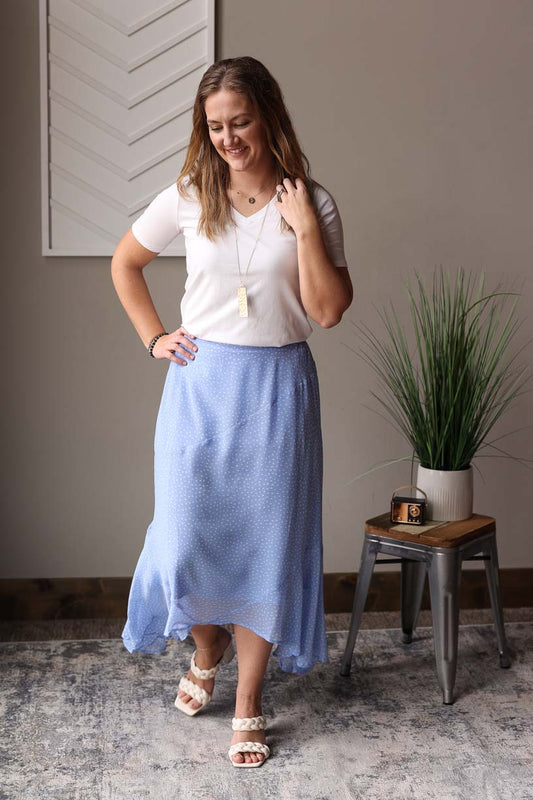 Elevate your spring/summer wardrobe with our Spring Blue Ivory Polka Dot Hi-Low Skirt. Perfect for church, weddings, and more, this pretty skirt gives off a light and airy vibe. Enjoy the warm weather in style with this must-have, stylish skirt.