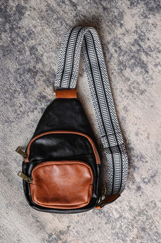 Elevate your style with our Black Contrast Patchwork Crossbody Bag. With its classy black and brown design, it's perfect for everyday life. Stay organized and hands-free while looking effortlessly chic. Classy Closet women's online boutique clothing for modest fashion and accessories.