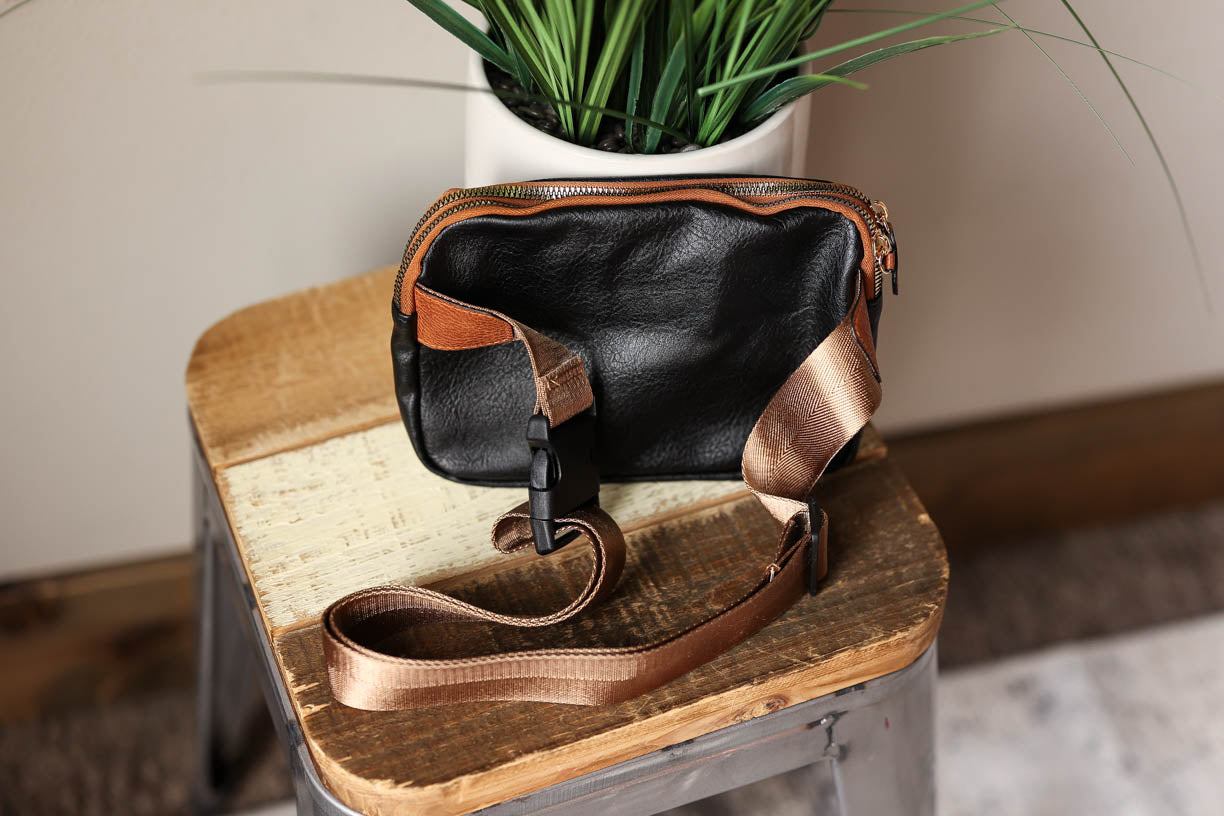 Make mom-life more manageable with this cute brown/black combo crossbody bag!  Classy CLoset Fall Fashion Outfits for Mom Casual Style