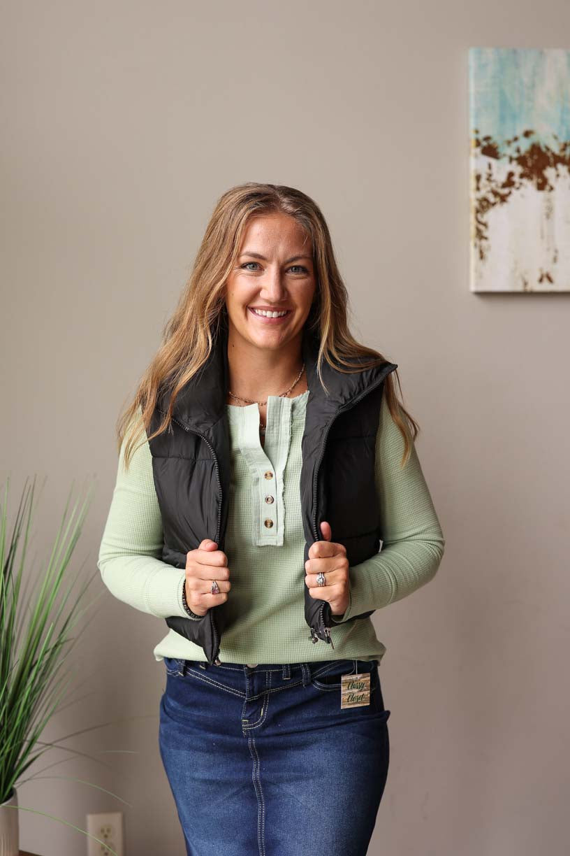 This Black Cropped Puffer Vest is perfect for adding a layer of warmth to your favorite outfits this cold season. CLASSY CLOSET ONLINE WOMEN'S BOUTIQUE FOR EFFORTLESS CHIC OUTFITS FALL FASHION AND MODEST STYLES