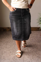 Our Black Stretch Denim Skirt is a comfy-cute staple with fun stitching—perfect for back-to-school and beyond.