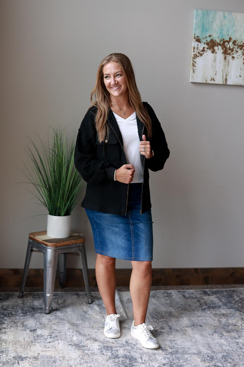 Black Hooded Zip Up Jacket. Made of black two-tone fabric with a drawstring hood, this jacket ensures maximum coziness and a timelessly trendy look. Beat the chill in style and keep cozy all season long! CLASSY CLOSET ONLINE WOMEN'S MODEST BOUTIQUE NEAR ME