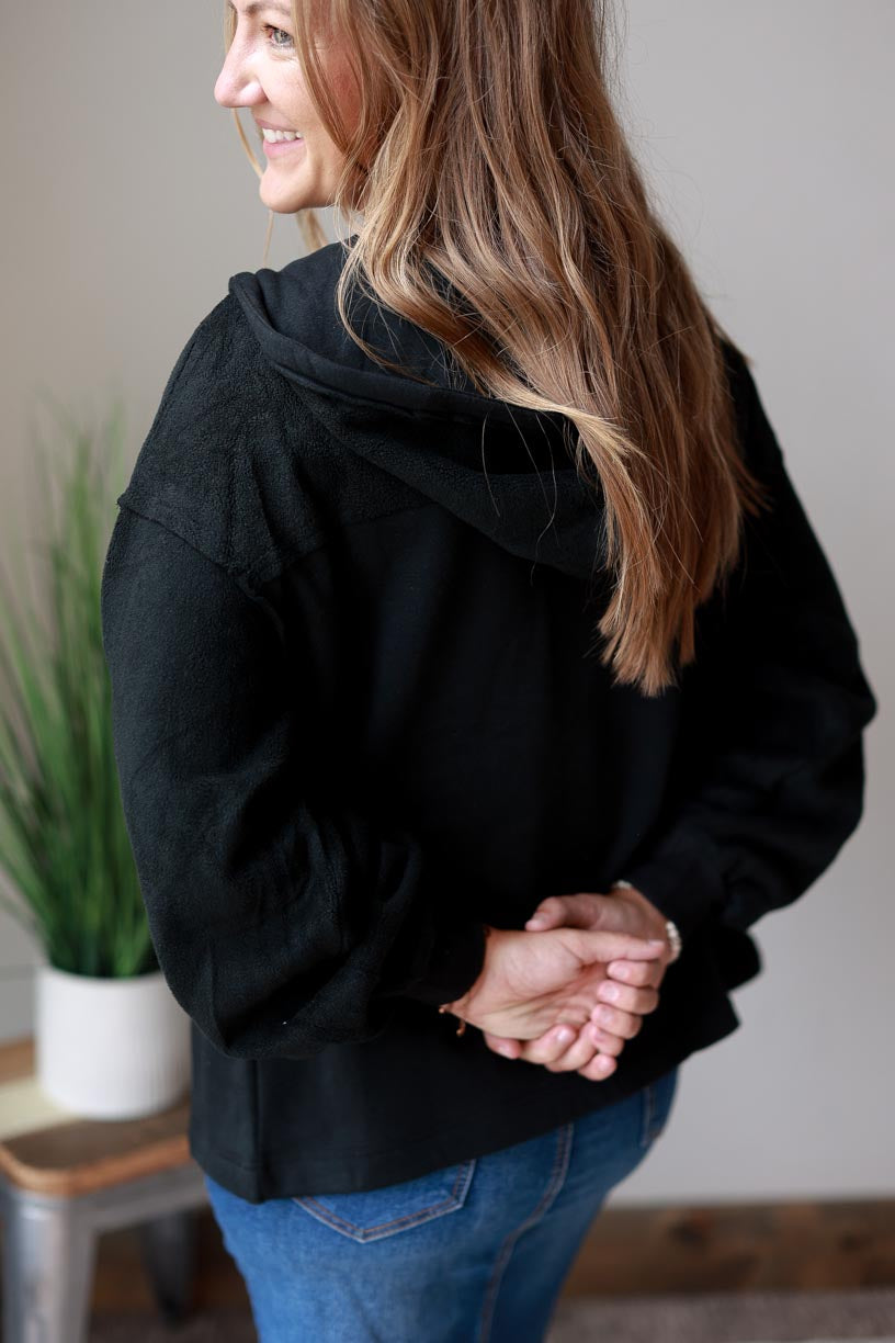 Black Hooded Zip Up Jacket. Made of black two-tone fabric with a drawstring hood, this jacket ensures maximum coziness and a timelessly trendy look. Beat the chill in style and keep cozy all season long! CLASSY CLOSET ONLINE WOMEN'S MODEST BOUTIQUE NEAR ME