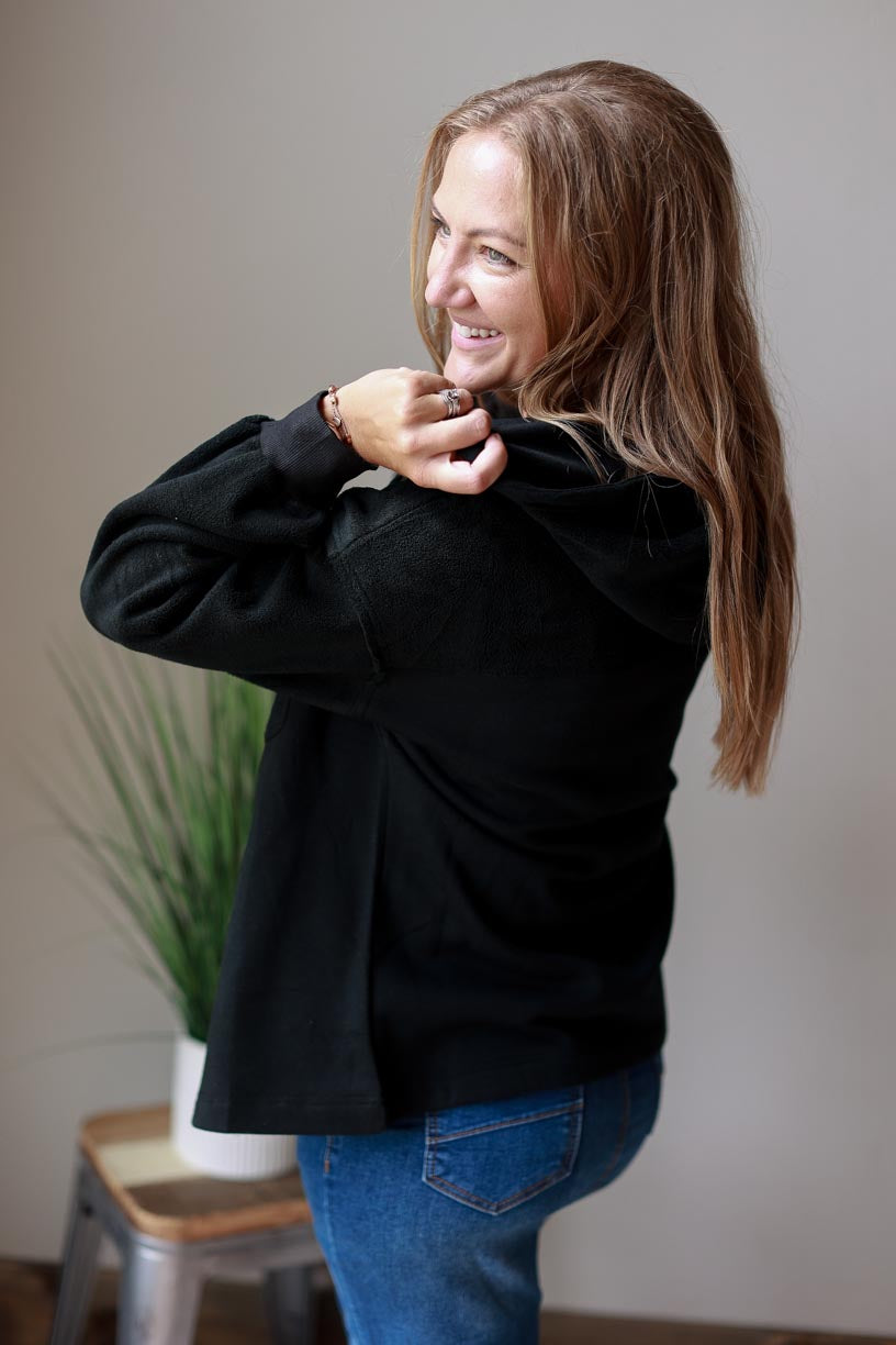 Black Hooded Zip Up Jacket. Made of black two-tone fabric with a drawstring hood, this jacket ensures maximum coziness and a timelessly trendy look. Beat the chill in style and keep cozy all season long! CLASSY CLOSET ONLINE WOMEN'S MODEST BOUTIQUE NEAR ME
