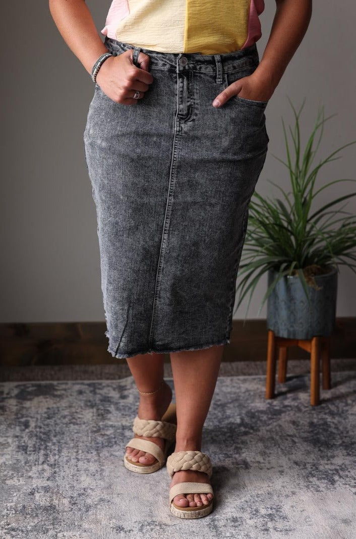 This Jade Black Mineral Midi Denim Skirt is the perfect blend of versatility and style. The black mineral wash adds a touch of fun to your everyday casual look. Pair it with your favorite top for effortless fashion. Classy Closet Modest Jean Skirt Store