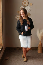 Woman wearing Black Drop Shoulder Pocket Crewneck Sweatshirt with relaxed fit, casual style perfect for everyday comfort