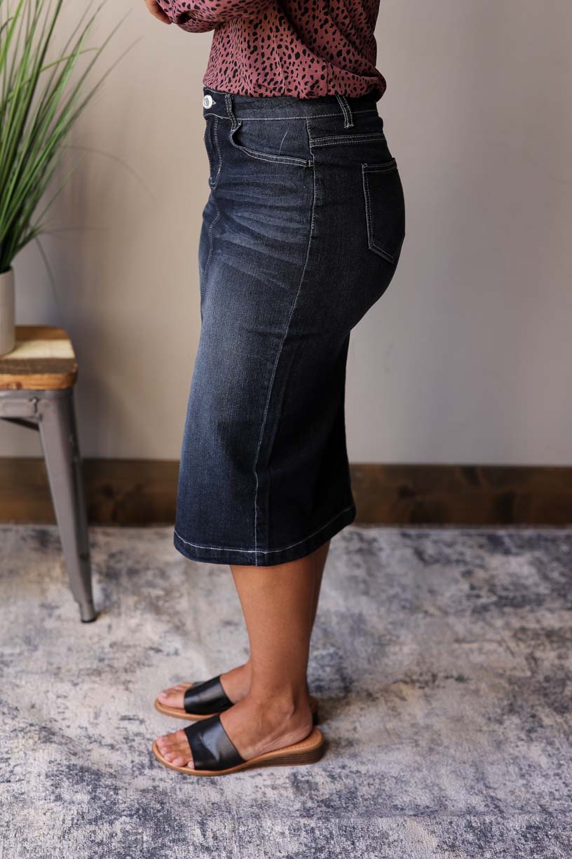 This Black Solid Midi Denim Skirt is a must-have item for any wardrobe. Classy Closet Online Women's Boutique for Modest Fall Winter Fashion