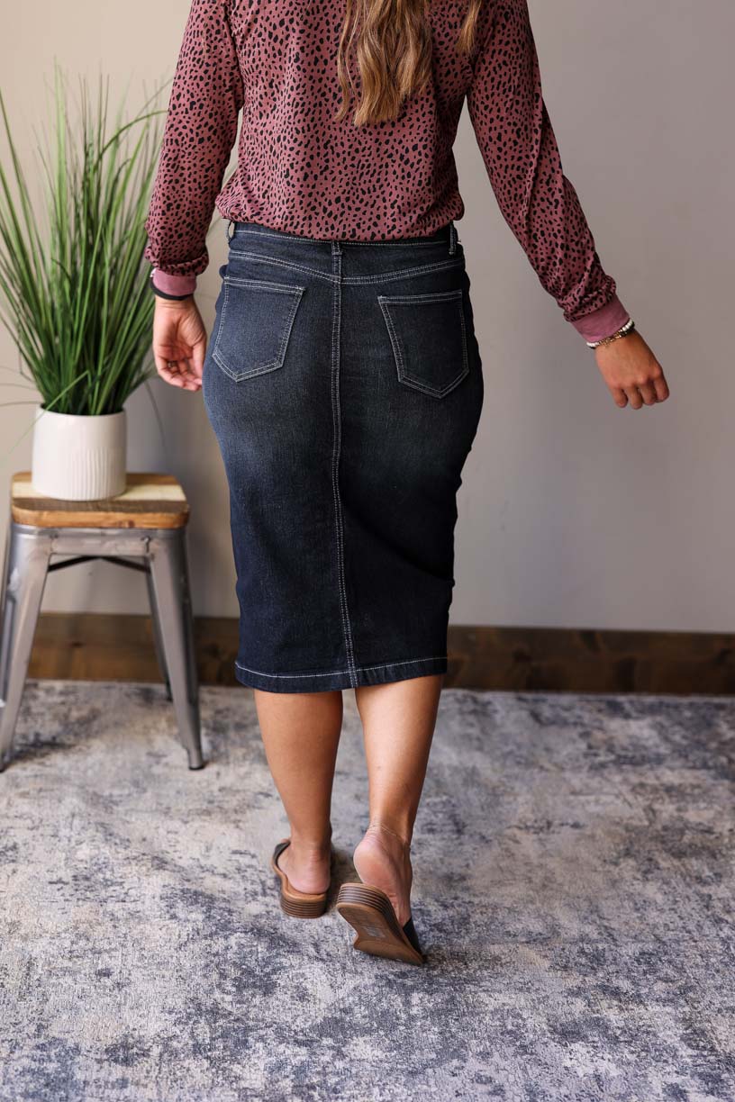 This Black Solid Midi Denim Skirt is a must-have item for any wardrobe. Classy Closet Online Women's Boutique for Modest Fall Winter Fashion