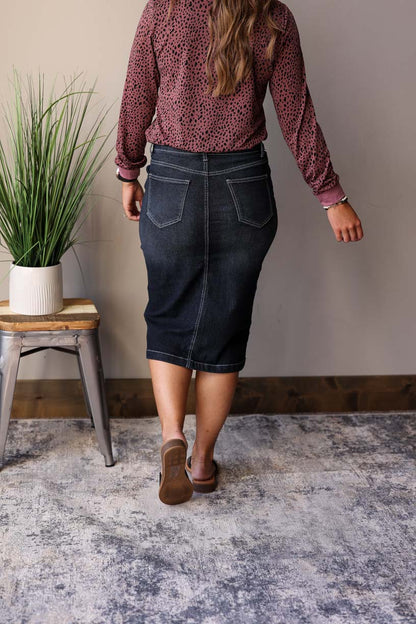 This Black Solid Midi Denim Skirt is a must-have item for any wardrobe. Classy Closet Online Women's Boutique for Modest Fall Winter Fashion
