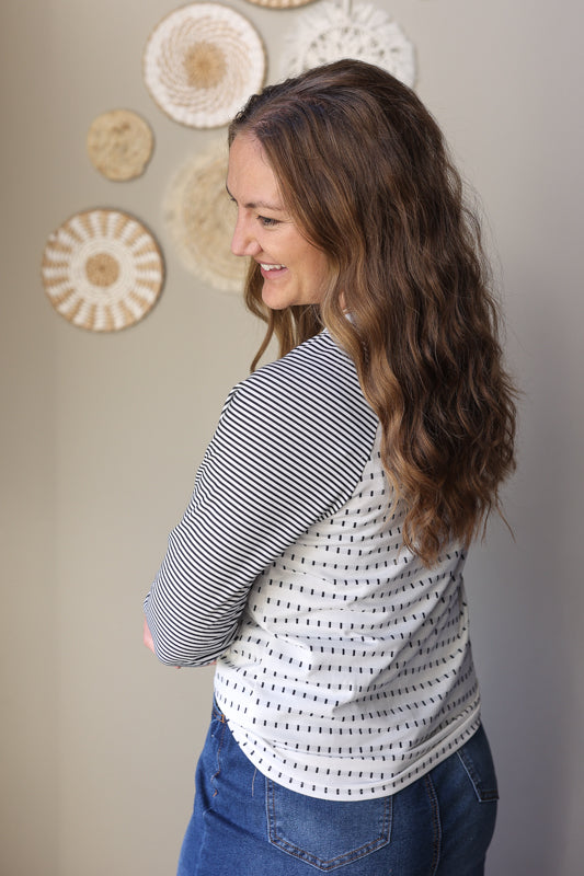 Black striped casual top for women styled in a comfy, modest everyday outfit
