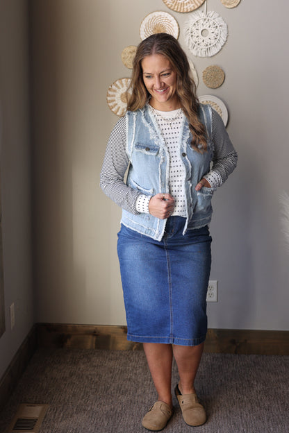 Lightweight denim vest jacket styled for everyday layering