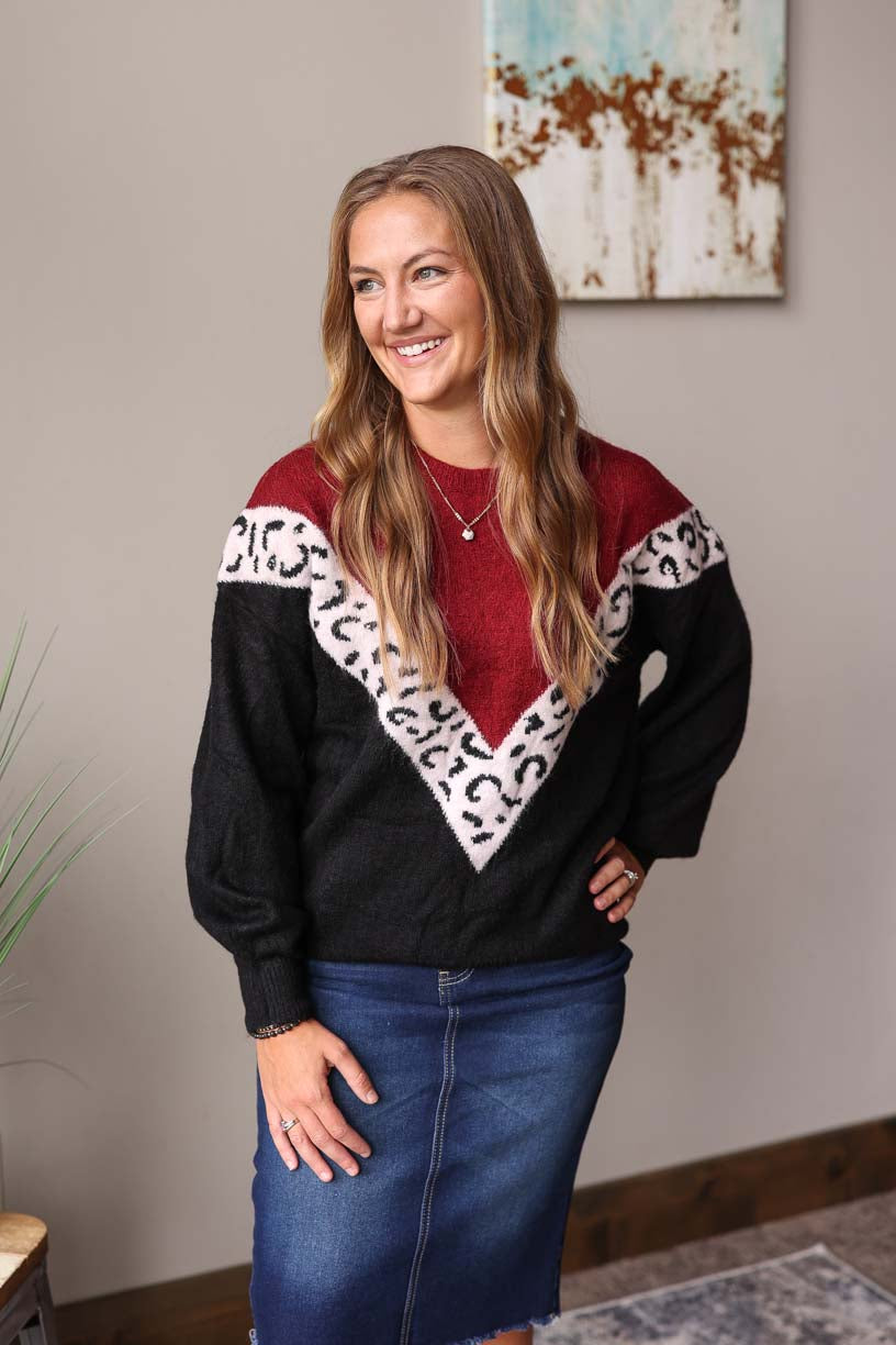 Wine Colorblock Chevron Leopard Top! The cozy material will keep you comfy while the chevron pattern gives you that extra touch of style – perfect for nights out or days at the office. Classy CLoset ONline Women's Holiday Outfits for Casual Style