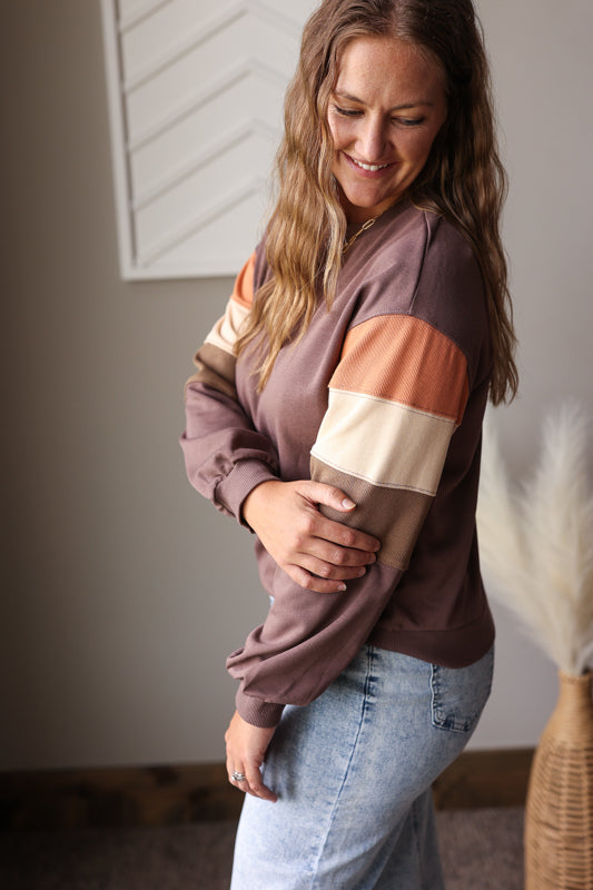 Cozy up this fall with our Dark Khaki Colorblock Sweatshirt—your go-to for effortless warmth and style. Perfect for layering or wearing solo, it brings all the snug, comfy vibes you want right now.