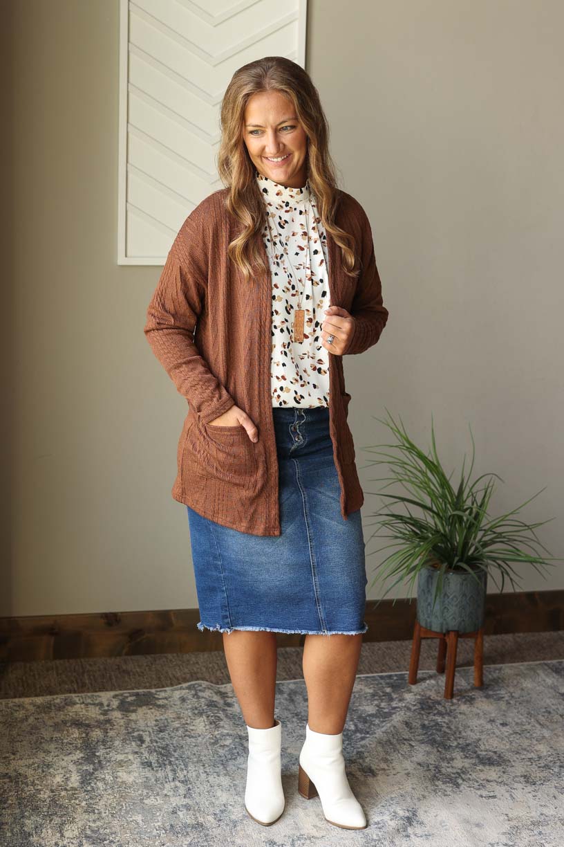 Stay cozy and stylish this fall/winter with our Coffee Textured Open Front Cardigan! With front pockets and a longer length, this versatile piece is perfect for any occasion. Dress it up or down and complete endless outfits with just one cardigan. Stay fashionable and functional at home, work, or church. Classy Closet cute fall winter cardigan for women, moms at home work church