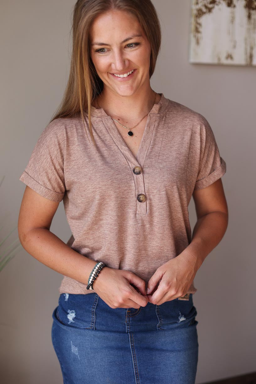 Heathered coral v-neck rolled short sleeve top with button details, perfect for cute, comfy, casual summer style at Classy Closet, an online women's modest clothing boutique.