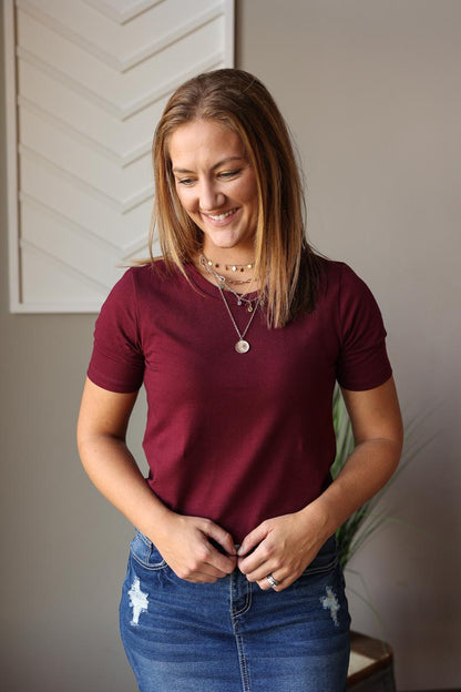 Made for everyday comfort, this Burgundy Short Sleeve Crewneck Top offers a lightweight and super soft feel.  Classy Closet Boutique for Women's Online Modest Fashion Clothing