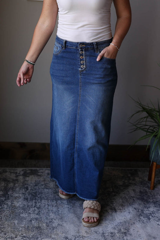Effortlessly chic, the Maxine Button Fly Long Denim Skirt is the perfect addition to any wardrobe. With its 4 button fly waistline and super stretchy material, you'll look and feel your best all day long. Upgrade your style game with this classy and comfortable skirt. Classy Closet modest jean skirts