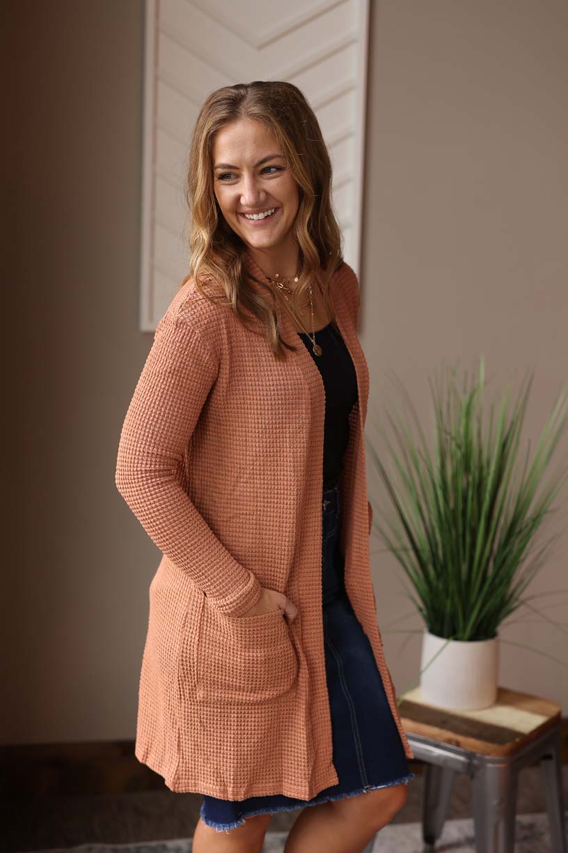 Brown Waffle Cardigan is an effortless and chic way to dress up any outfit. Made with comfortable and waffle knit material, this cardigan is perfect for transitioning between seasons at Classy Closet WOmen's Online Boutique Near Me
