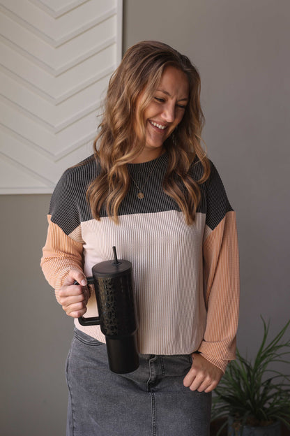 Enjoy the simplicity and comfort of our Black Colorblock Top. With its versatile design, it's easy to create stylish everyday outfits for any occasion - whether you're at home, running errands, working, or even going on a coffee date. Classy Closet Fall Winter 2024 Cute Mom Outfits for Everyday Style