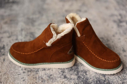 Chestnut Fur Slip On Shoes are the perfect addition to any winter outfit. Made with a fur inside and a sleek, slip-on style, these shoes provide warmth and comfort without sacrificing style from Classy Closet Online Women's Boutique.