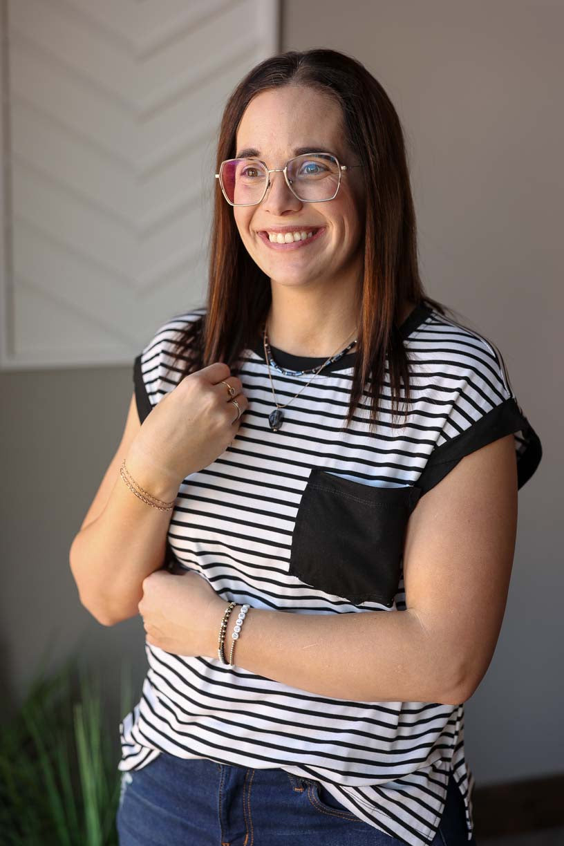 Effortlessly elevate your everyday style with our Black Stripe Pocket Crewneck Top. The classic black and white stripes add a touch of sophistication to any outfit, while the versatile design makes it perfect for layering or wearing on its own. Simple yet stylish, this top is a must-have addition to your wardrobe. Classy Closet online women's boutique clothing store for trendy affordable clothing and modest fashion. 