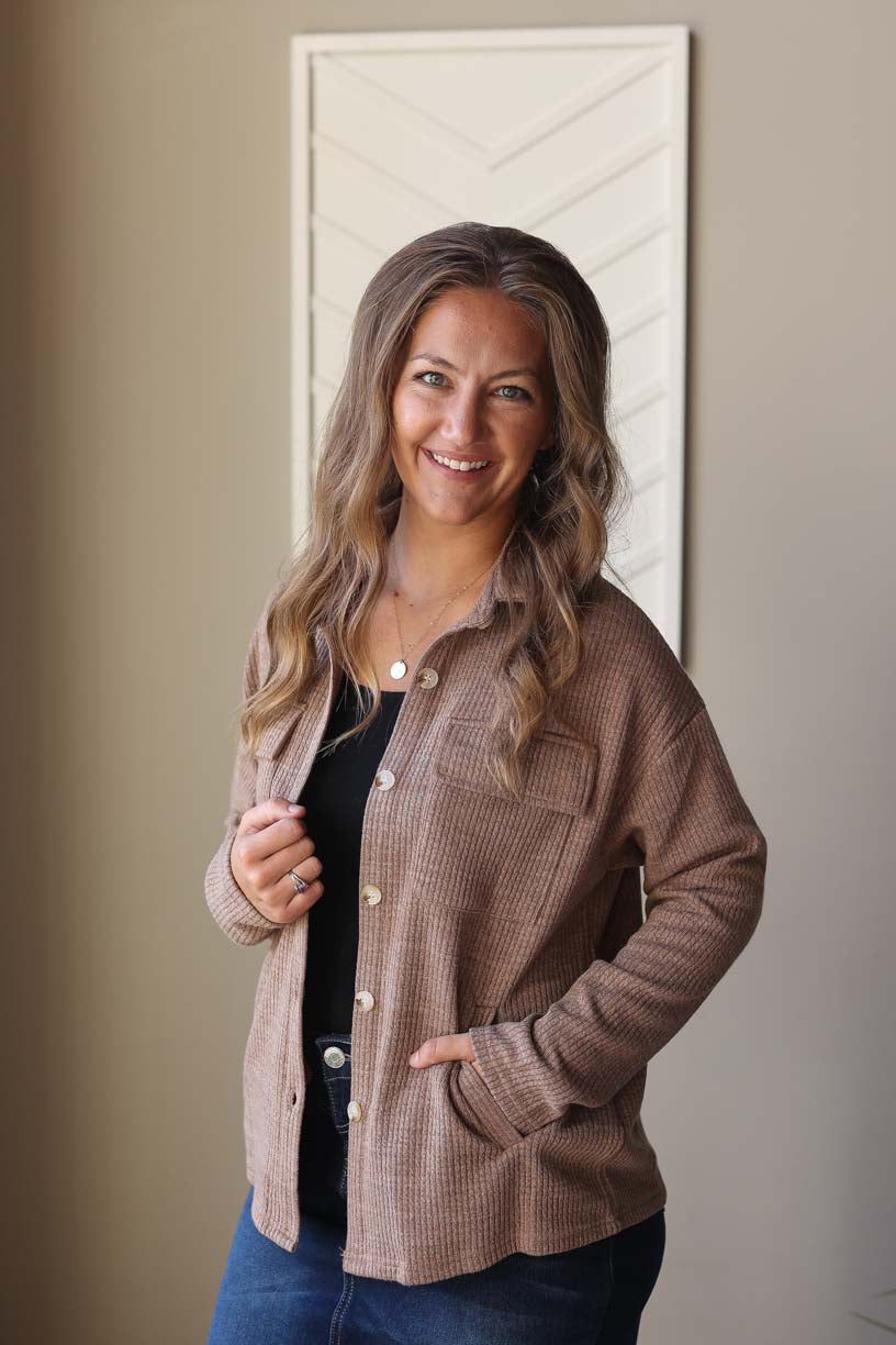 Effortlessly stylish and versatile, our Dark Khaki Ribbed Knit Shacket is the perfect layering piece. Made from cozy and soft ribbed knit material, it features the added convenience of pockets. Dress it up or down for any occasion. Classy Closet online women's boutique for modest fashion clothing at Hull, Iowa. 