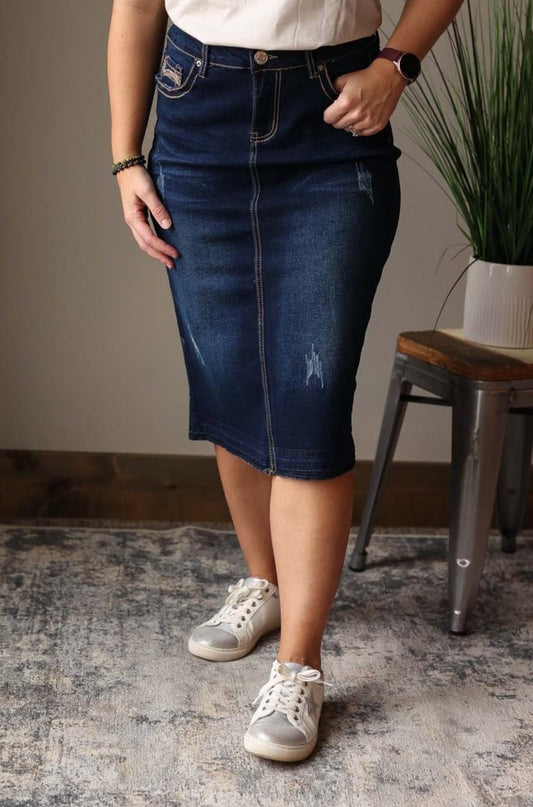 uplevel your wardrobe with our Brown Line Stitching Midi Denim Skirt! With its dark wash denim and thick brown line stitching details on the pockets, this skirt effortlessly adds a touch of style to any outfit. Classy Closet Modest Women's Clothing for Cute Affordable Fashion