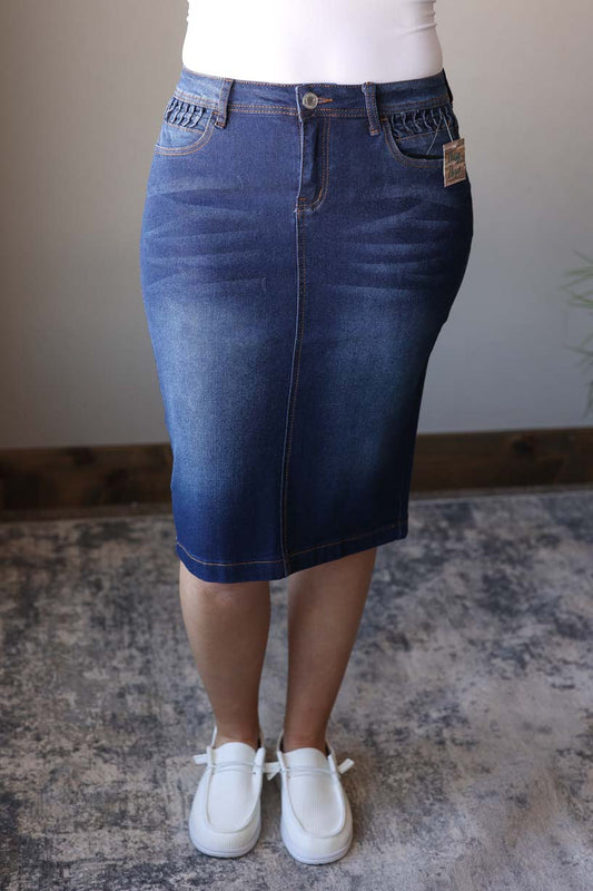Get ready to elevate your denim game with our Dark Wash Ruched Stretch Denim Skirt! Made from a stretchy, comfortable material, this knee-length skirt features stylish ruched pockets on both the front and back. With a button and zipper fly, it's the perfect mix of fashion and function. Add it to your wardrobe today! Hard to find denim skirts at Classy Closet Hull Iowa for women's modest skirts and midi skirts. 