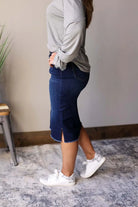 Becca Dark Wash Side Slit Denim Skirt. This stylish jean skirt features a dark wash for a sleek and sophisticated look that you can wear to work, school, or date night for fall winter outfits.
