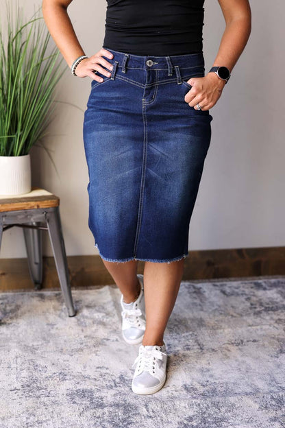 Sophia Dark Wash Skirt is perfect for any occasion from date nights to the office. It is made with a dark wash for a chic look and features a feminine waist stitching detail for fall winter fashion.